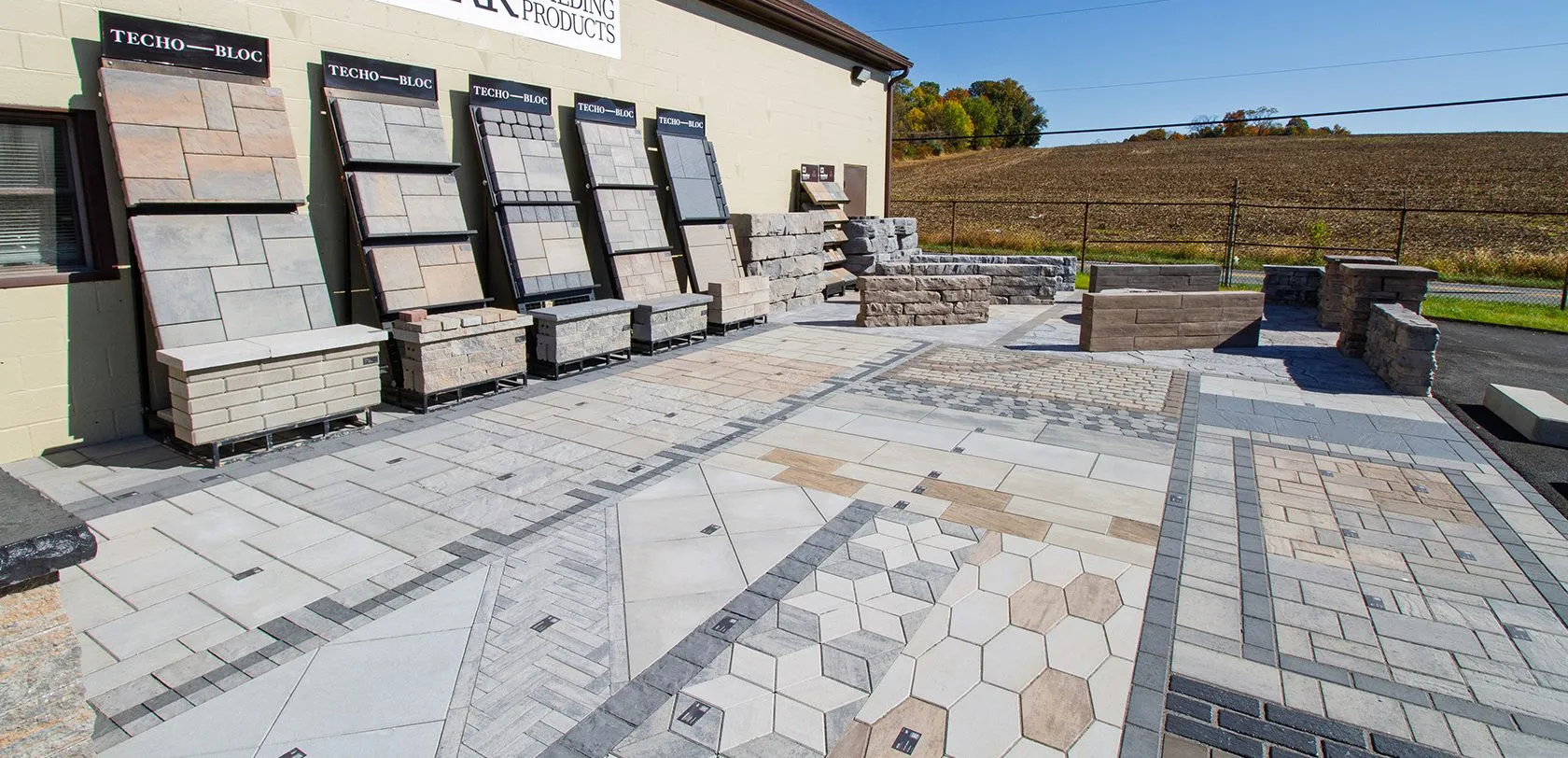 A scene at NewLine Hardscapes’ Shrewsbury facility with materials and equipment, featured in the company gallery.