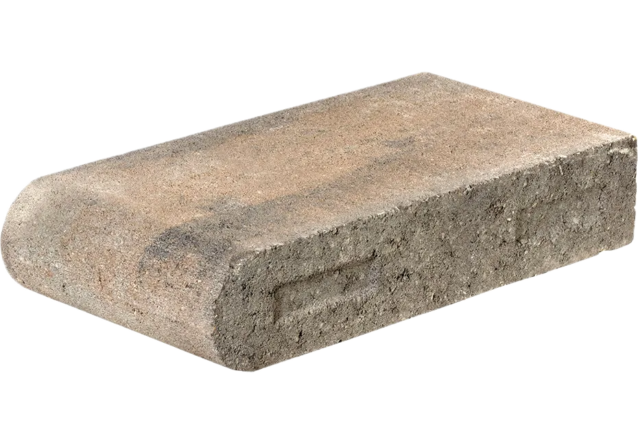 Coping stone for wall or pool edge, smooth rolled front. Featured in the pavers section of Newline Hardscapes.