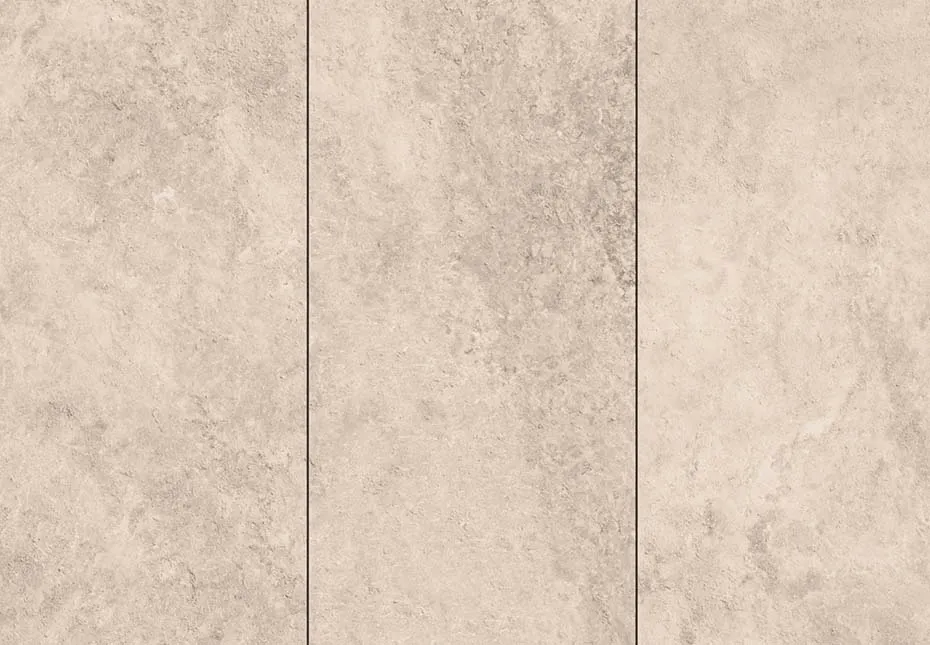 Close up of 18 by 36-inch porcelain tiles in the color source beige. The tiles are featured in the products section of Newline Hardscapes.
