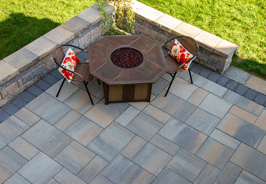 A modern patio finished with Veranda™ smooth‑face slab pavers, featured on the Veranda pavers page.