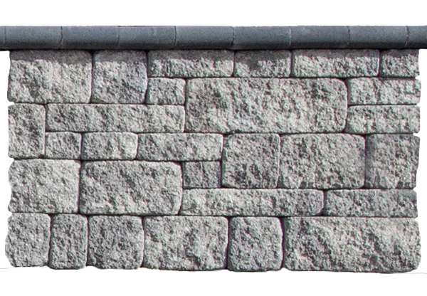 A rough‑textured Napa® retaining wall with dark capstones featured in the Walls section.
